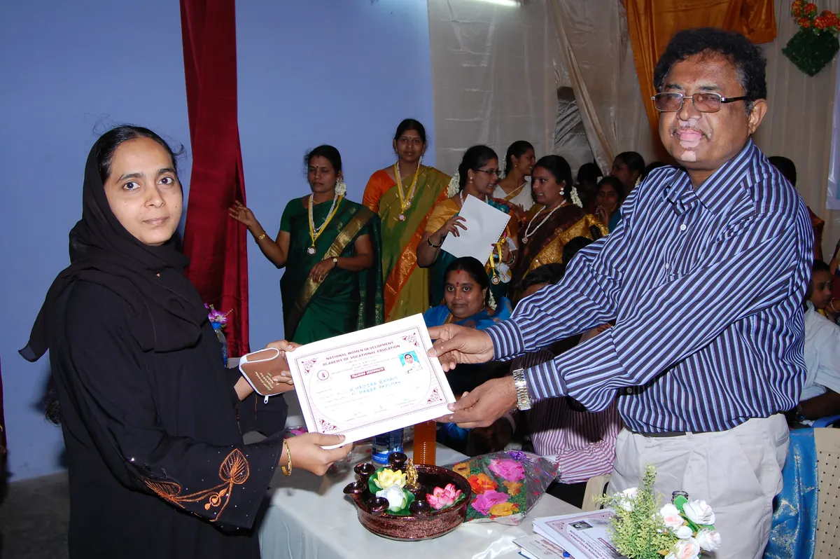 Certificate of appreciation presented to SHG beneficiary for prompt loan repayment in 2014