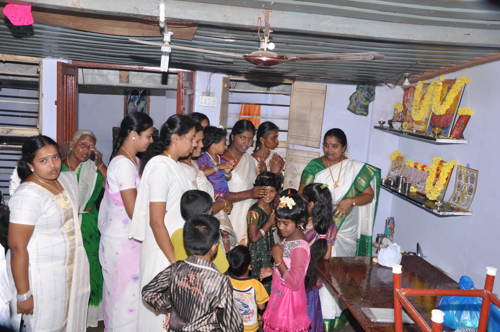 Women and children participating in a community-based activity